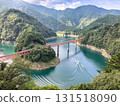 Okuoikojo Station and the red bridge across Lake Sesso 131518090