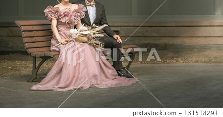 Couple taking wedding photos in a retro building 131518291