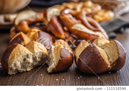 Crunchy bavarian buns on wooden table. 131518590