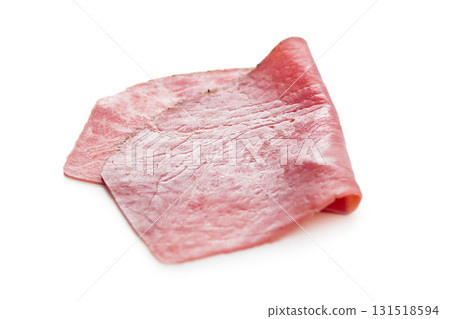 Sliced beef pastrami isolated on white background. 131518594