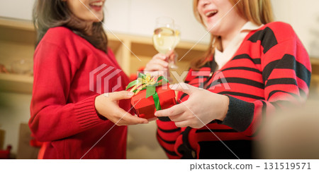 Celebrating Christmas with Friends and Holiday Gifts Celebrating Christmas with Friends and Holiday Gifts 131519571