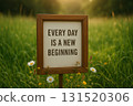 EVERY DAY IS A NEW BEGINNING, Framed motivational quote on grass background emphasizing daily fresh starts. 131520306