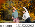 Cardio endurance exercises, use a fitness watch and an app. Runners athletes in fitness clothes. 131522202