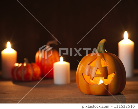 Halloween image: ghost pumpkin and candles 131522510