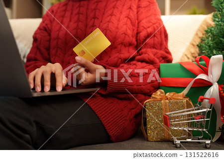 Shopping for Christmas. Online shopping with credit card and gifts. Shopping for Christmas. Online shopping with credit card and gifts. 131522616