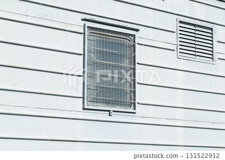 Windows behind bars in a special carriage for transporting prisoners, industry. Copy space for text 131522912