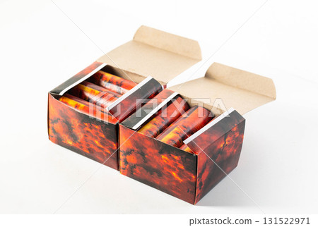Packaging of flying circoblits fireworks on the table. Safety with pyrotechnics, close-up Packaging of flying circoblits fireworks on the table. Safety with pyrotechnics, close-up 131522971
