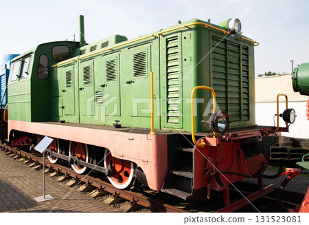 Vintage green locomotive on display at a railway museum showcasing historical transportation technology 131523081