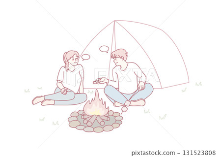 Man and woman relaxing near campfire Man and woman relaxing near campfire 131523808