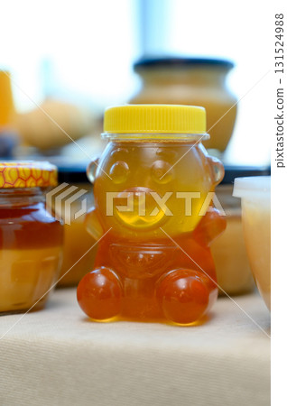 Homemade honey and jam in glass jars Homemade honey and jam in glass jars 131524988