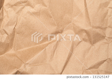 Craft paper texture. Rough creased surface ideal for packaging, wrapping, DIY projects, scrapbooking, arts, design, and creative applications. 131525147