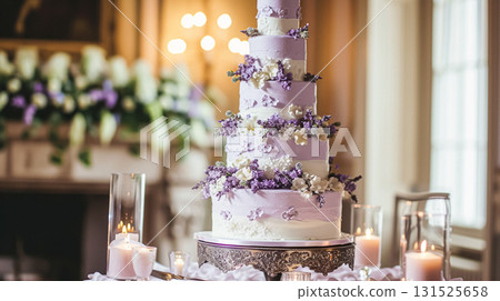 Wedding cake with lavender flowers. Holiday table decoration 131525658