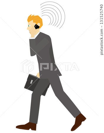 A businessman having a business meeting on a smartphone. 131525740