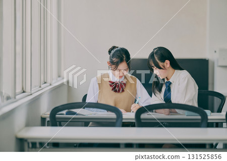 Female student attending cram school 131525856