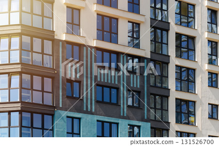 Closeup of modern high rise tower in urban metropolis. Multi story residential block with balconies, Closeup of modern high rise tower in urban metropolis. Multi story residential block with balconies, 131526700