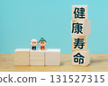 Image of elderly people and building blocks with an awareness of healthy life expectancy 131527315
