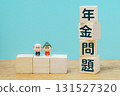 Building blocks and images of elderly people representing the pension issue 131527320