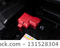 Car battery positive terminal with red protective cover 131528304