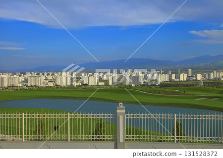ASHGABAT, TURKMENISTAN. View of the new neighborhood on a background of mountains. 131528372