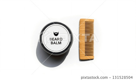 Beard balm tin with a wooden comb placed beside it, isolated on white. Men's grooming and cosmetic product set. Top view flat lay with copy space 131528504