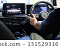 Men driving cars, commuting, driving trips, etc. 131529316