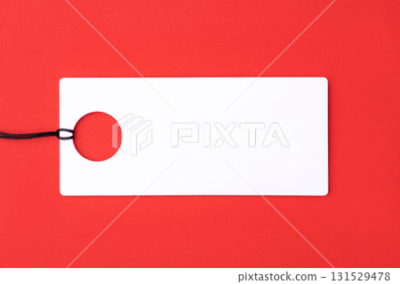 Empty white tag on red background 131529478