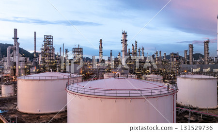 Aerial view oil and gas refinery plant at night, Global business energy logistic transportation, Oil and gas refinery petrochemical industrial, Petrochemical refinery industrial energy supply chain. 131529736