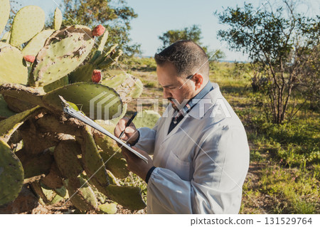 Professional Herborist Writing Notes While Working Professional Herborist Writing Notes While Working 131529764