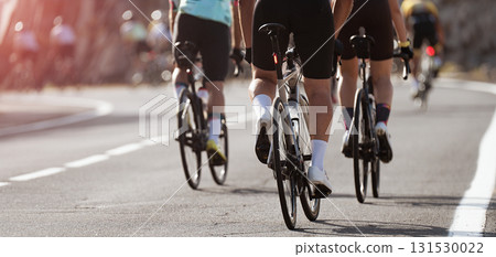 Cycling competition, cyclist athletes riding a race Cycling competition, cyclist athletes riding a race 131530022