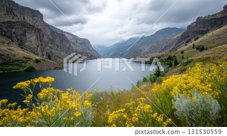 Mountainous Landscape With Wildflowers And Serene Lake. Nature'S Tranquility And Scenic Beauty 131530559