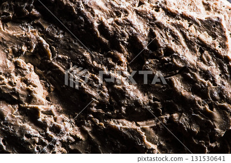 The rough texture of the stone consists of numerous microcracks 131530641