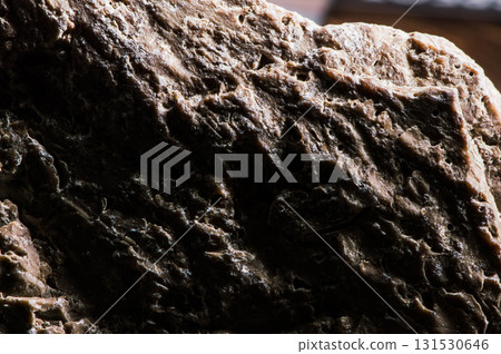 A gray stone texture with chaotic inclusions A gray stone texture with chaotic inclusions 131530646