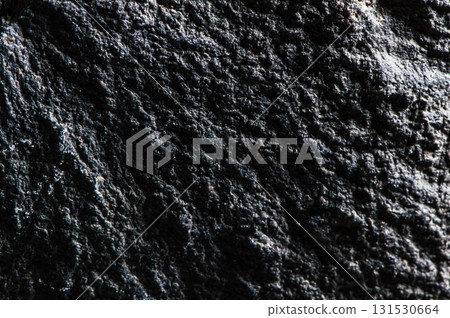 The natural surface of the stone is covered with micro-inclusions 131530664