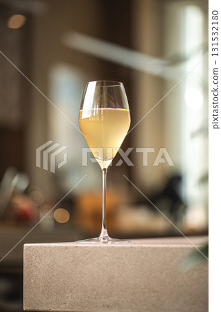 Elegant glass of wine cocktail on wooden table Elegant glass of wine cocktail on wooden table 131532180
