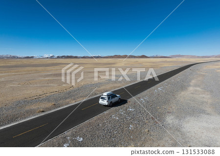 Driving car on the high altitude trail 131533088