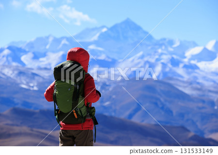 Successful woman hiker open arms to Mount Everest in Tibet, China 131533149