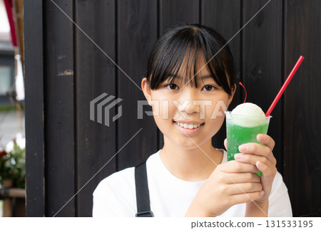 A teenage girl eating her way around Kusatsu Onsen on a trip 131533195