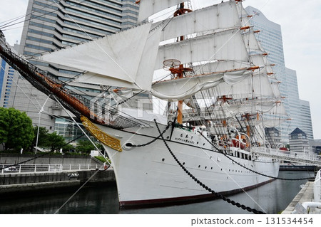A sailing ship moored in the canal and the main castle A sailing ship moored in the canal and the main castle 131534454