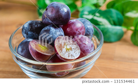 Pione grapes served in a glass bowl Pione grapes served in a glass bowl 131534461