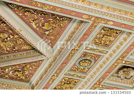 Luxurious, intricately gilded ceiling panels featuring gold leaf and floral rosettes, Luxurious, intricately gilded ceiling panels featuring gold leaf and floral rosettes, 131534503