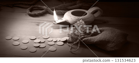 A loop made from old thick rope and coins A loop made from old thick rope and coins 131534623