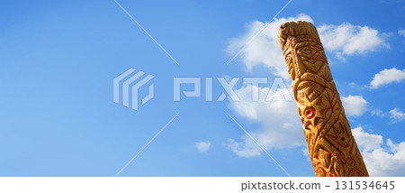 Old wooden idol in the field Old wooden idol in the field 131534645