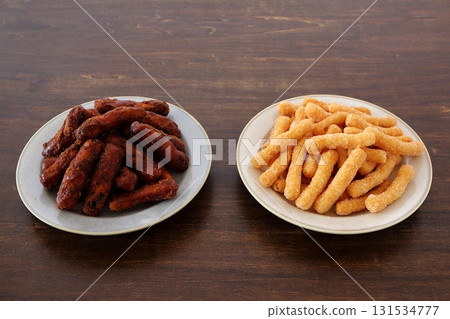 Black Karinto (Brown Sugar Karinto) and White Karinto on the table background Black Karinto (Brown Sugar Karinto) and White Karinto on the table background 131534777