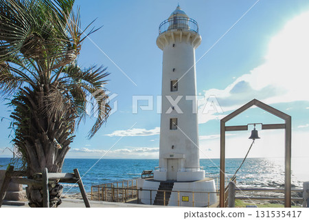 Nomasaki Lighthouse and the Bell of Love, standing against the blue sky and sea, Mihama Town, Chita District (Aichi Prefecture) Nomasaki Lighthouse and the Bell of Love, standing against the blue sky and sea, Mihama Town, Chita District (Aichi Prefecture) 131535417