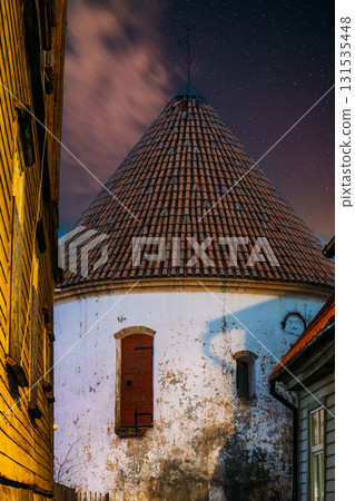 Parnu, Estonia. Night Evening View Of Red Tower Is The Only Surviving Part Of City Defensive Wall, Was Used As Prison Parnu, Estonia. Night Evening View Of Red Tower Is The Only Surviving Part Of City Defensive Wall, Was Used As Prison 131535448