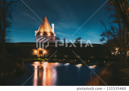 Kuressaare, Saaremaa Island, Estonia. Episcopal Castle In Evening Blue Hour Night. Traditional Medieval Architecture, Famous Attraction Landmark. Old Tower 131535460