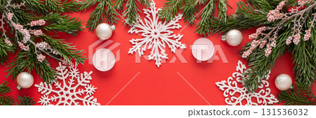 Red Christmas background with fir branches Red Christmas background with fir branches 131536032