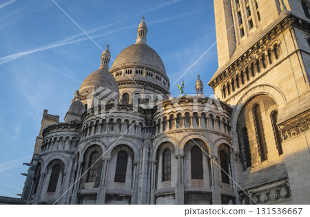 Montmartre sunset view of Sacre Coeur Basilica in Paris with vibrant skies Montmartre sunset view of Sacre Coeur Basilica in Paris with vibrant skies 131536667