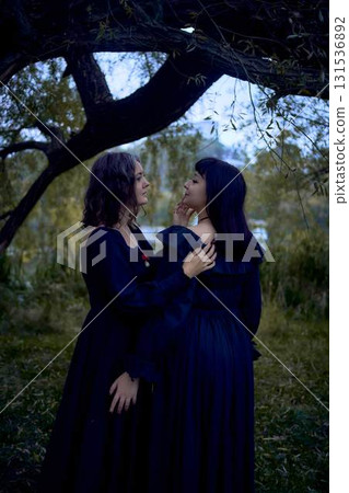 two women in the black long dresses on Halloween, brides of Dracula, vampires, bite, kiss, two women in the black long dresses on Halloween, brides of Dracula, vampires, bite, kiss, 131536892