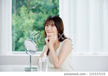 Beauty image: Young woman's skin care scene 131537235